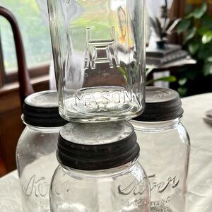 Lot of 4 Mason Transparent Glass Jars (Kerr and Atlas) with Lids.